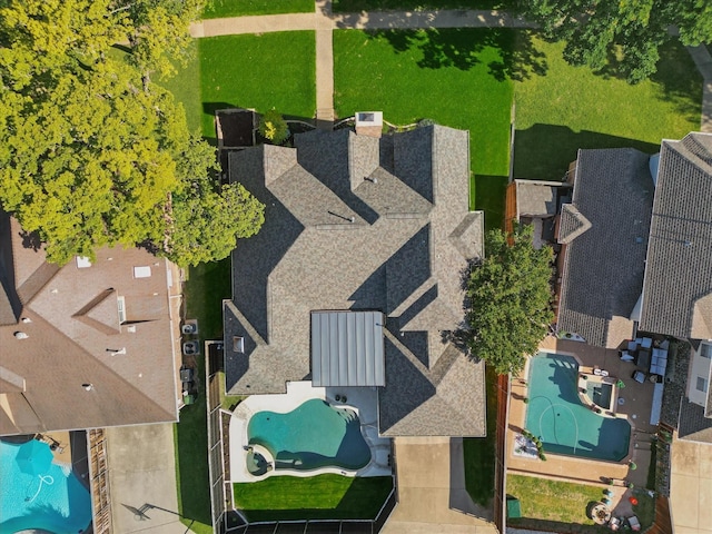 drone / aerial view of a pool