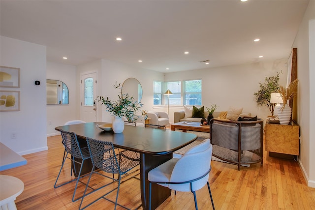 1205 Ranier St, Dallas, TX 75208 - dining area featuring recessed lighting, light wood-style floors, and baseboards