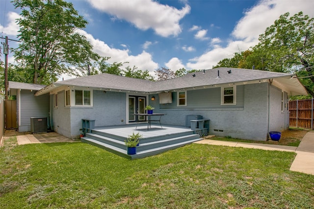 1205 Ranier St, Dallas, TX 75208 - rear view of property featuring brick siding, central AC unit, a deck, and crawl space