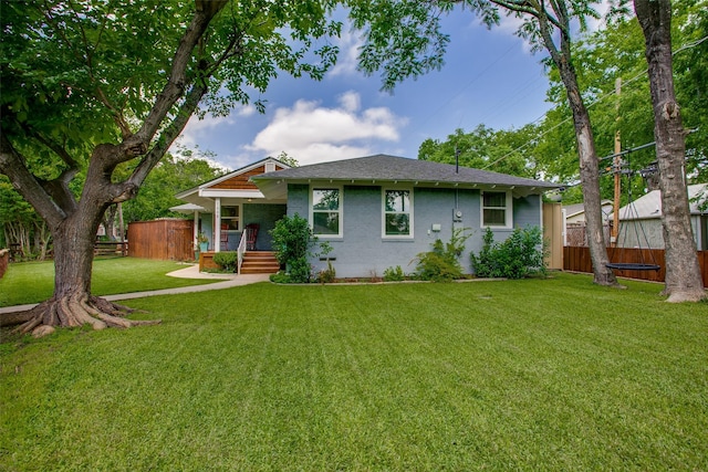 1205 Ranier St, Dallas, TX 75208 - view of front of home with a shingled roof and brick siding