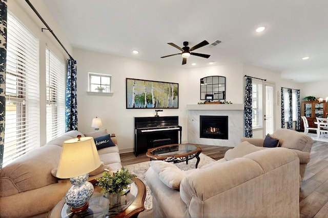 14433 Balmoral Pl, Fort Worth, TX 76008 - living room featuring wood finished floors, ceiling fan, recessed lighting, a high end fireplace, and baseboards