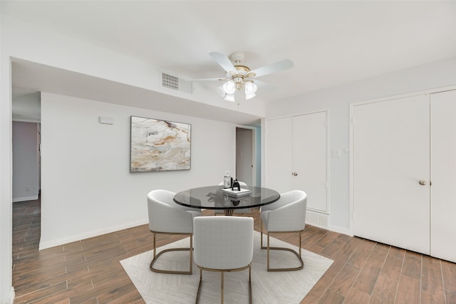 3243 Weather Vane Ln, Dallas, TX 75228 - dining space with wood finished floors, a ceiling fan, and baseboards