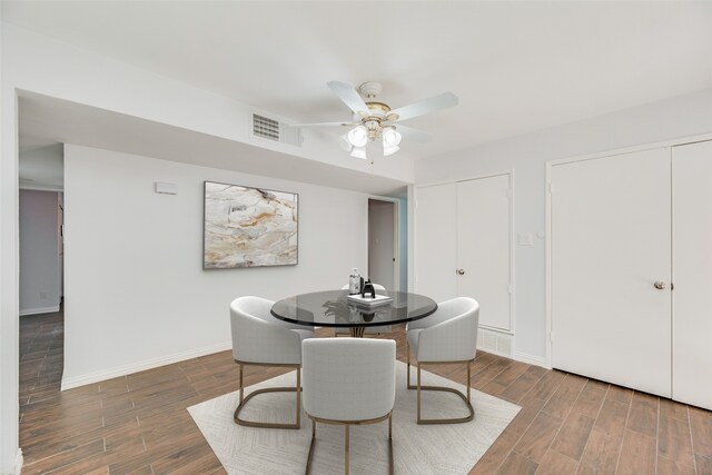 3243 Weather Vane Ln, Dallas, TX 75228 - dining space with wood finished floors, a ceiling fan, and baseboards