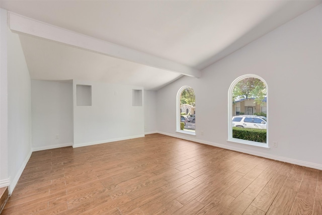 3243 Weather Vane Ln, Dallas, TX 75228 - unfurnished living room featuring light wood-style floors and baseboards