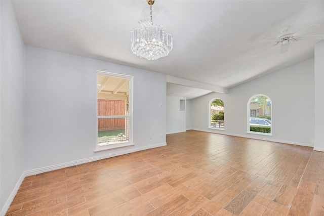 3243 Weather Vane Ln, Dallas, TX 75228 - unfurnished living room with light wood-style flooring, a chandelier, and baseboards
