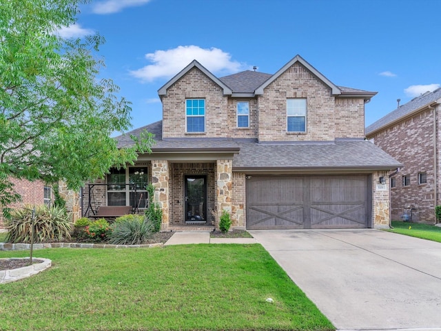 8400 Whistling Duck, Fort Worth, TX 76118 - view of front of home with an attached garage, a front lawn, concrete driveway, roof with shingles, and brick siding