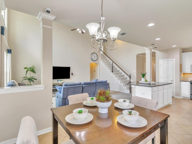 8400 Whistling Duck, Fort Worth, TX 76118 - dining area featuring ornate columns, light tile patterned floors, recessed lighting, stairs, and a chandelier