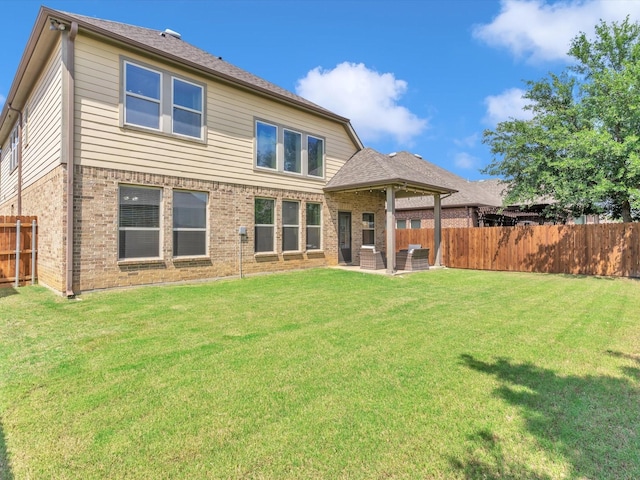 8400 Whistling Duck, Fort Worth, TX 76118 - rear view of house featuring brick siding and a patio