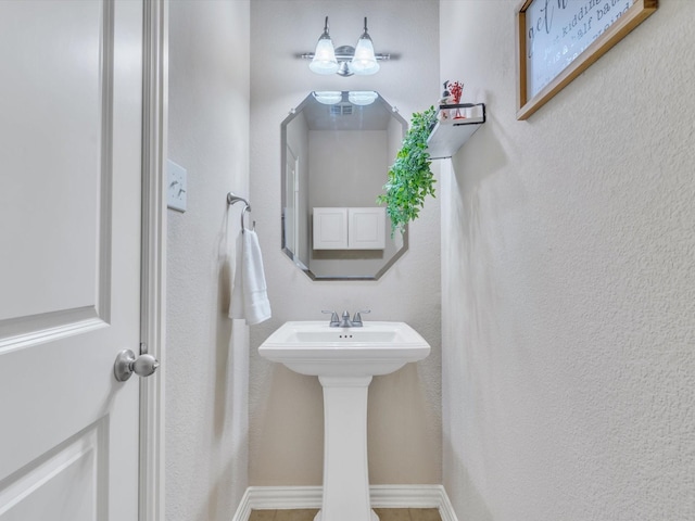 8400 Whistling Duck, Fort Worth, TX 76118 - bathroom featuring baseboards