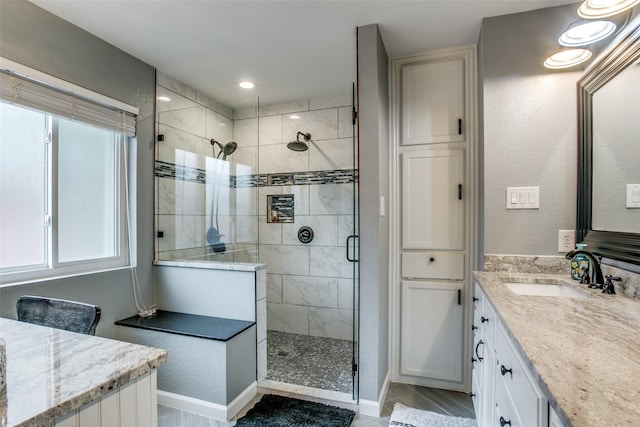 1420 Clearwater Ct, Grapevine, TX 76051 - full bathroom with a shower stall, vanity, and baseboards