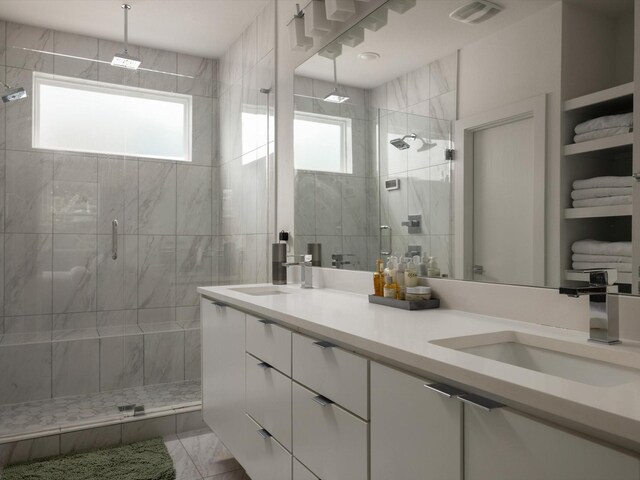 1510 N Washington Ave Unit 503, Dallas, TX 75204 - full bath featuring a stall shower, plenty of natural light, and double vanity
