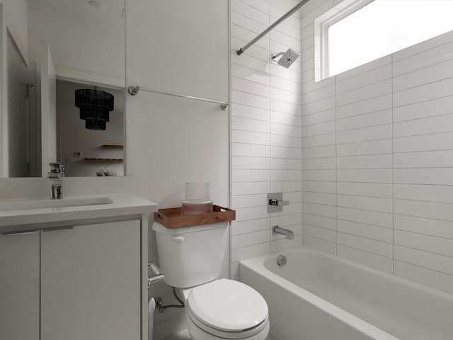 1510 N Washington Ave Unit 503, Dallas, TX 75204 - bathroom featuring toilet, vanity, and shower / tub combination
