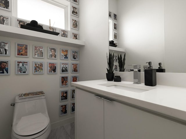 1510 N Washington Ave Unit 503, Dallas, TX 75204 - half bathroom featuring vanity, toilet, and marble look tiles