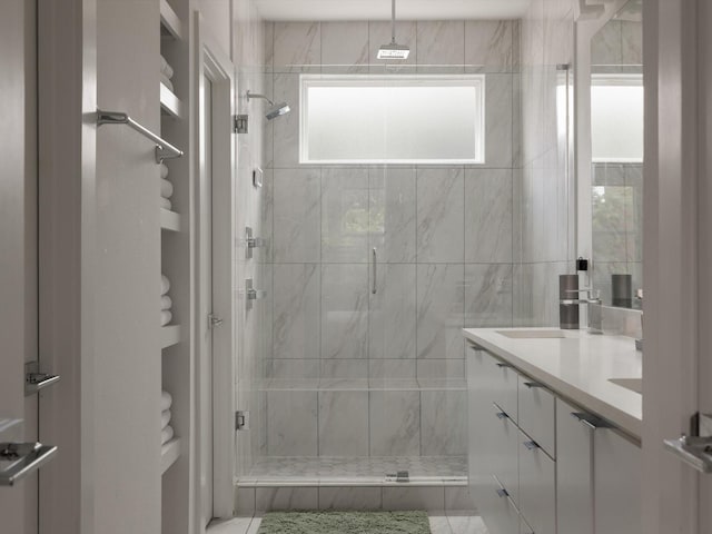 1510 N Washington Ave Unit 503, Dallas, TX 75204 - bathroom featuring a shower stall and double vanity