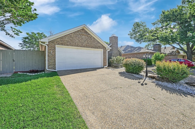2718 Laurel Oaks Dr, Garland, TX 75044 - single story home featuring brick siding, a front lawn, a chimney, and a gate