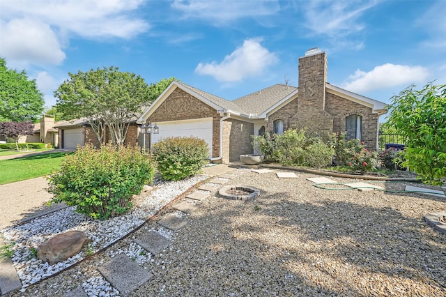 2718 Laurel Oaks Dr, Garland, TX 75044 - single story home featuring a garage, brick siding, and a chimney