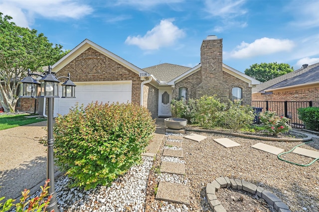 2718 Laurel Oaks Dr, Garland, TX 75044 - view of front of house with brick siding, fence, an attached garage, and a chimney