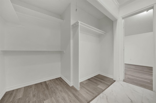 2718 Laurel Oaks Dr, Garland, TX 75044 - spacious closet with wood finished floors