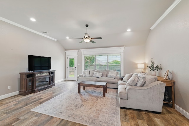2607 Austin Dr, Granbury, TX 76048 - living area featuring vaulted ceiling, a ceiling fan, ornamental molding, baseboards, and wood finished floors