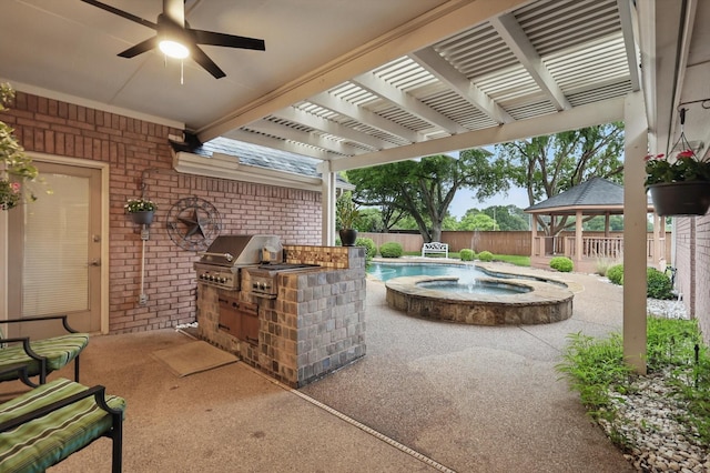view of patio / terrace with a gazebo, area for grilling, a fenced backyard, and a ceiling fan