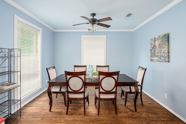 7112 Royal Glen Trl, Mckinney, TX 75072 - dining space with dark wood finished floors, crown molding, baseboards, and a ceiling fan