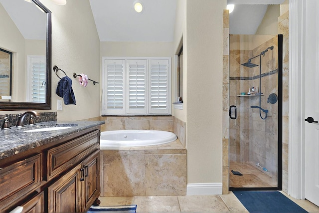 4018 Bear Creek Ct, Celina, TX 75078 - bathroom featuring a shower stall, a bath, vanity, and lofted ceiling