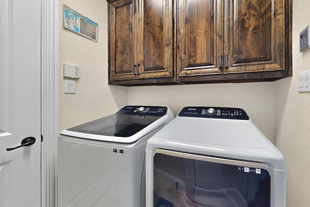4018 Bear Creek Ct, Celina, TX 75078 - laundry area featuring separate washer and dryer, a textured wall, and cabinet space