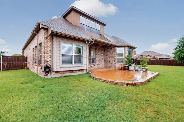 4018 Bear Creek Ct, Celina, TX 75078 - rear view of house featuring brick siding, a patio area, and roof with shingles