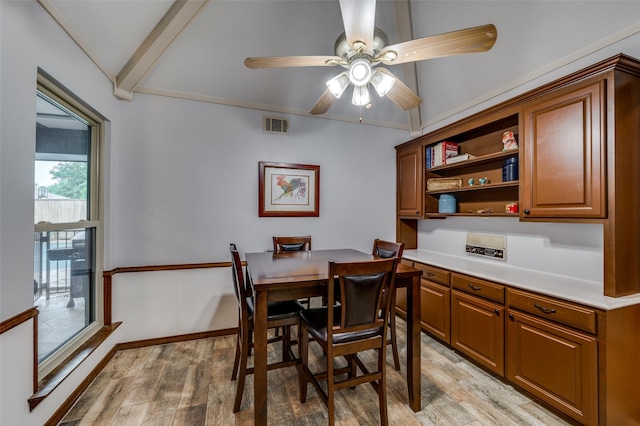 2715 Peach Tree Dr, Carrollton, TX 75006 - dining space featuring light wood-style flooring, a ceiling fan, and beamed ceiling
