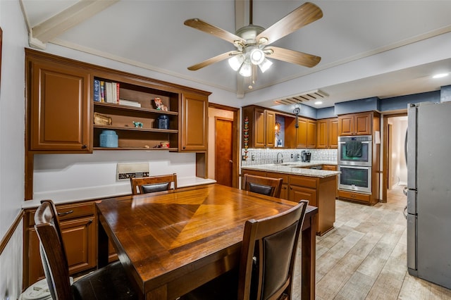 2715 Peach Tree Dr, Carrollton, TX 75006 - dining area featuring ceiling fan and light wood-style flooring