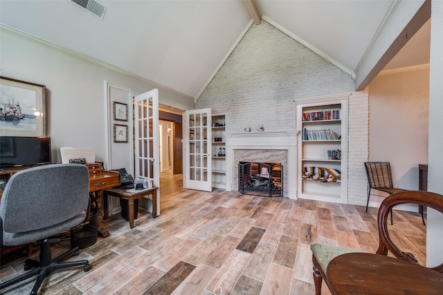 2715 Peach Tree Dr, Carrollton, TX 75006 - office space with french doors, wood finished floors, a fireplace, and crown molding