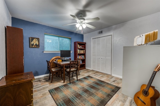 2715 Peach Tree Dr, Carrollton, TX 75006 - home office with ceiling fan, wood finished floors, and baseboards