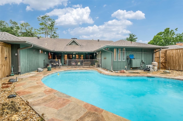 2715 Peach Tree Dr, Carrollton, TX 75006 - view of swimming pool featuring fence and a patio area