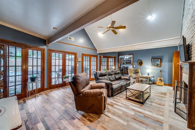 2715 Peach Tree Dr, Carrollton, TX 75006 - living room with french doors, high vaulted ceiling, ceiling fan, a fireplace, and wood finished floors
