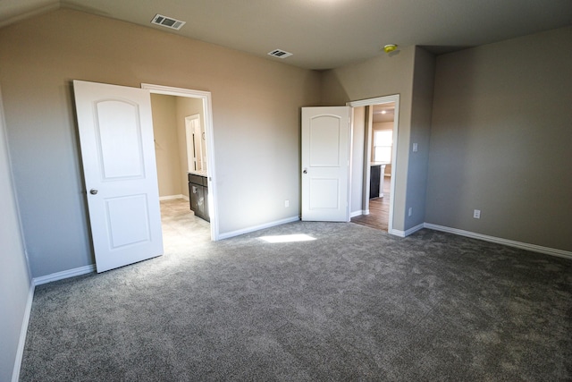504 Lakeway Ln, Justin, TX 76247 - unfurnished bedroom featuring carpet flooring and baseboards