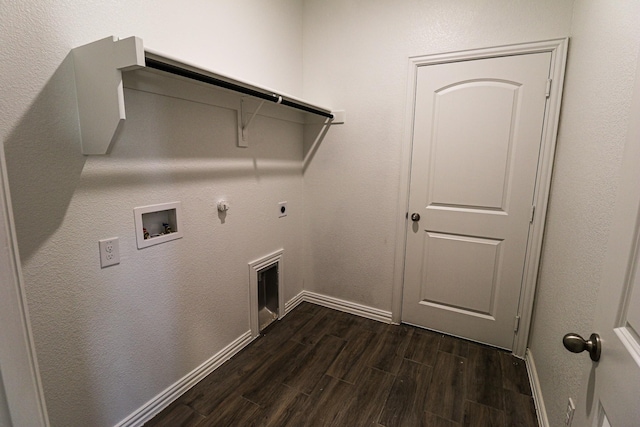 504 Lakeway Ln, Justin, TX 76247 - laundry area with hookup for a gas dryer, dark wood-style flooring, washer hookup, hookup for an electric dryer, and baseboards