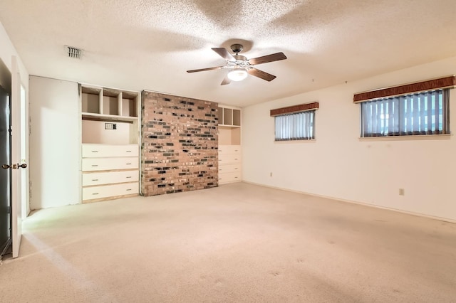 107 San Medina Ln, Joshua, TX 76058 - carpeted spare room featuring a ceiling fan and a textured ceiling