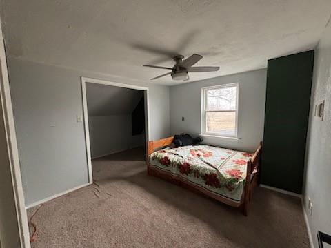 2220 N Clements St, Gainesville, TX 76240 - bedroom with carpet floors, ceiling fan, and baseboards