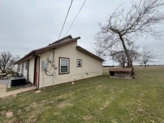 2220 N Clements St, Gainesville, TX 76240 - view of home's exterior with a yard
