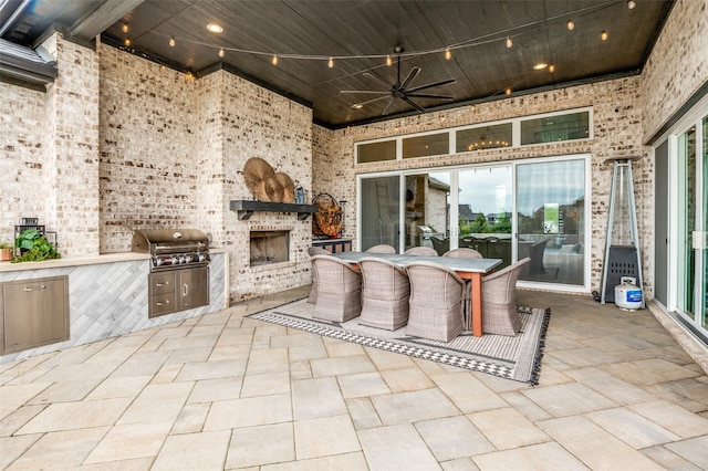 5208 Westfield Dr, Parker, TX 75002 - view of patio / terrace featuring an outdoor brick fireplace, grilling area, exterior kitchen, ceiling fan, and outdoor dining space