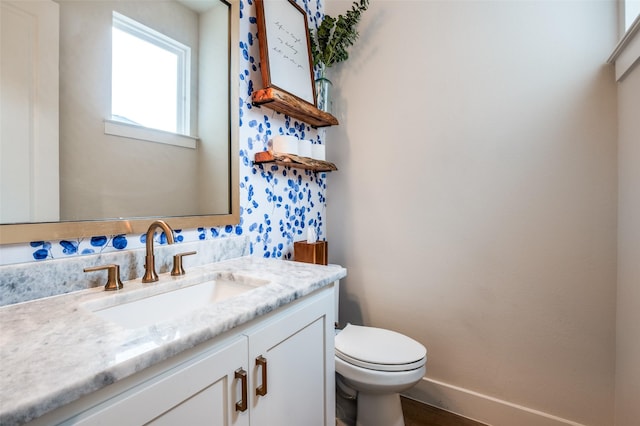 5208 Westfield Dr, Parker, TX 75002 - bathroom featuring vanity, toilet, baseboards, and wood finished floors
