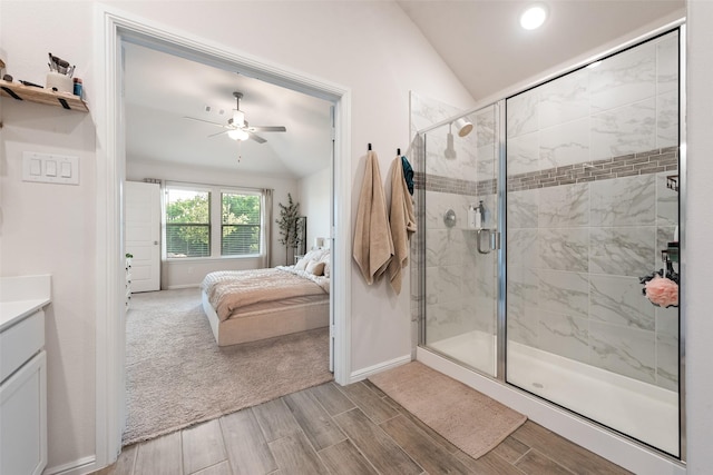 148 Greenback Trl, Fort Worth, TX 76131 - ensuite bathroom with lofted ceiling, ceiling fan, wood finish floors, a shower stall, and vanity