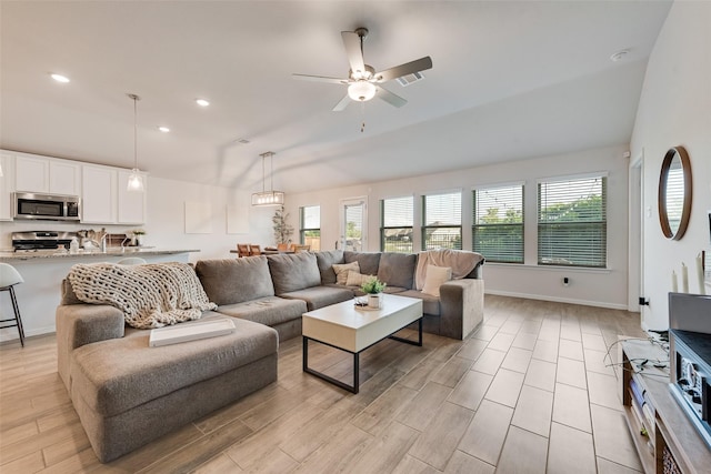 148 Greenback Trl, Fort Worth, TX 76131 - living area with lofted ceiling, healthy amount of natural light, ceiling fan, light wood-type flooring, and recessed lighting
