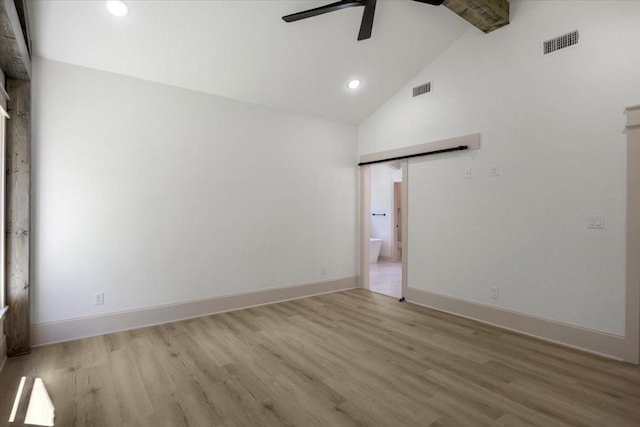 14541 Woodland Crk, Tyler, TX 75706 - empty room featuring a ceiling fan, wood finished floors, recessed lighting, high vaulted ceiling, and baseboards