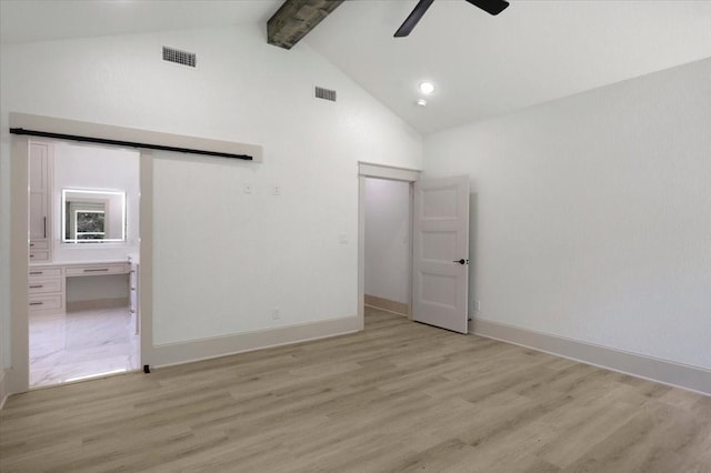 14541 Woodland Crk, Tyler, TX 75706 - unfurnished bedroom featuring beamed ceiling, high vaulted ceiling, light wood finished floors, baseboards, and ceiling fan