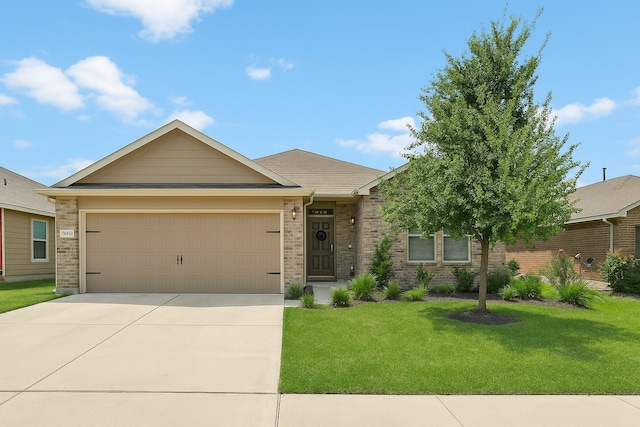 ranch-style home featuring concrete driveway, a front lawn, a garage, and brick siding