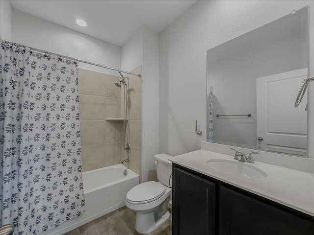 full bath featuring toilet, wood finished floors, vanity, and shower / bath combination with curtain