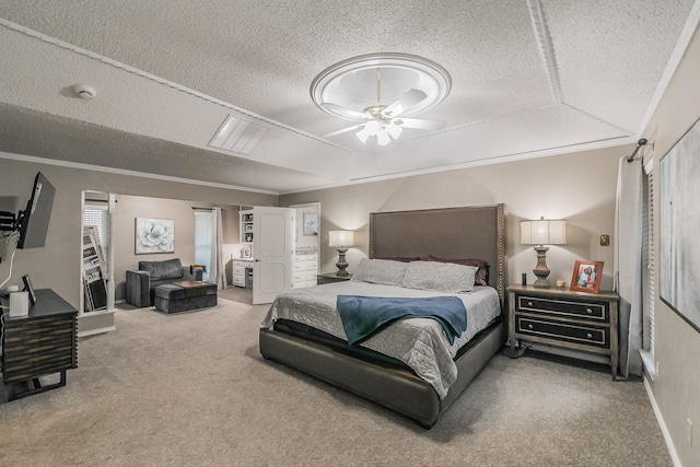 bedroom featuring carpet floors, a textured ceiling, crown molding, and baseboards