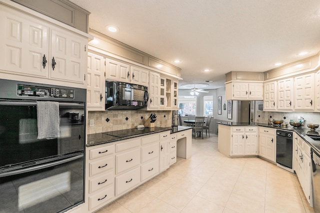 2314 Wakeforest Ct, Arlington, TX 76012 - kitchen featuring black appliances, decorative backsplash, glass insert cabinets, a peninsula, and recessed lighting