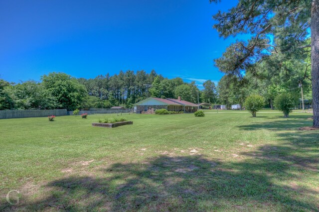 451 Burney St, Coushatta, LA 71019 - view of yard with a garden